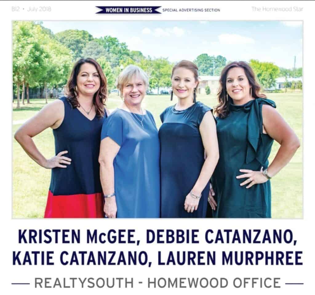 Group photo of four women professionals outdoors at Homewood Office.