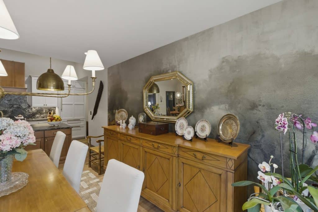 Elegant dining room with vintage accents and modern decor.