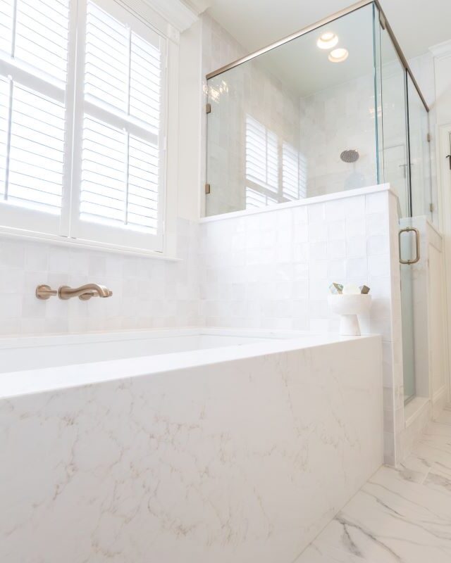 Elegant Highland Lakes bathroom with modern fixtures and a glass shower enclosure.