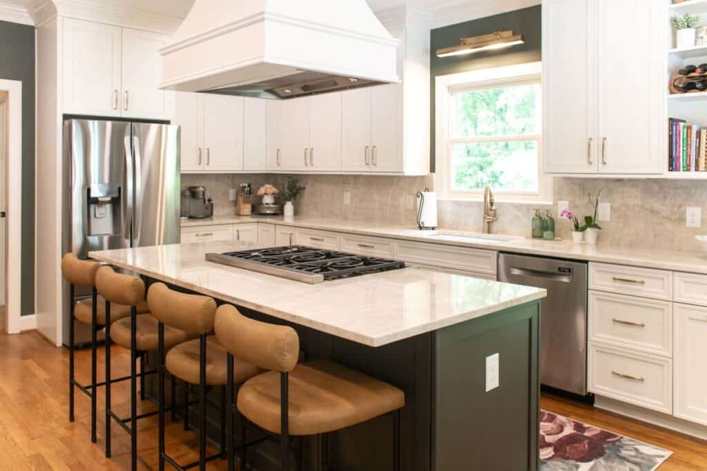 Bright modern kitchen with white cabinets and island in Pelham, AL.