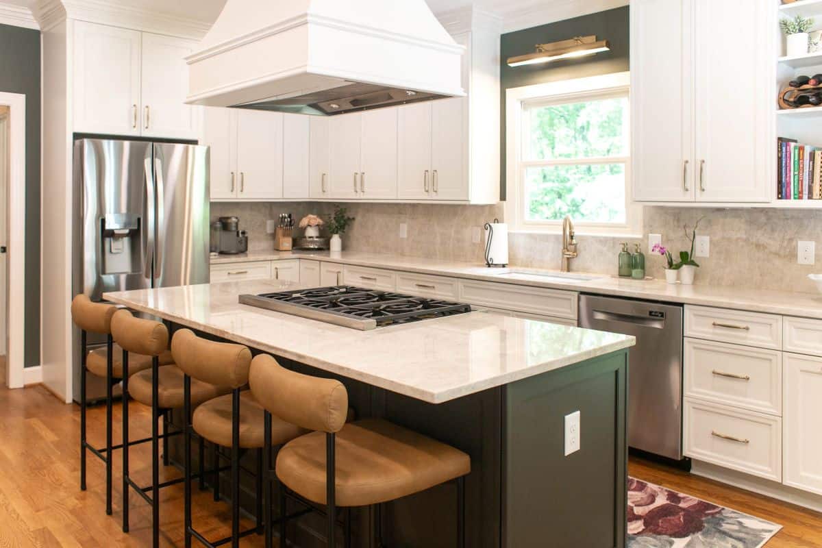 Bright modern kitchen with white cabinets and island in Pelham, AL.